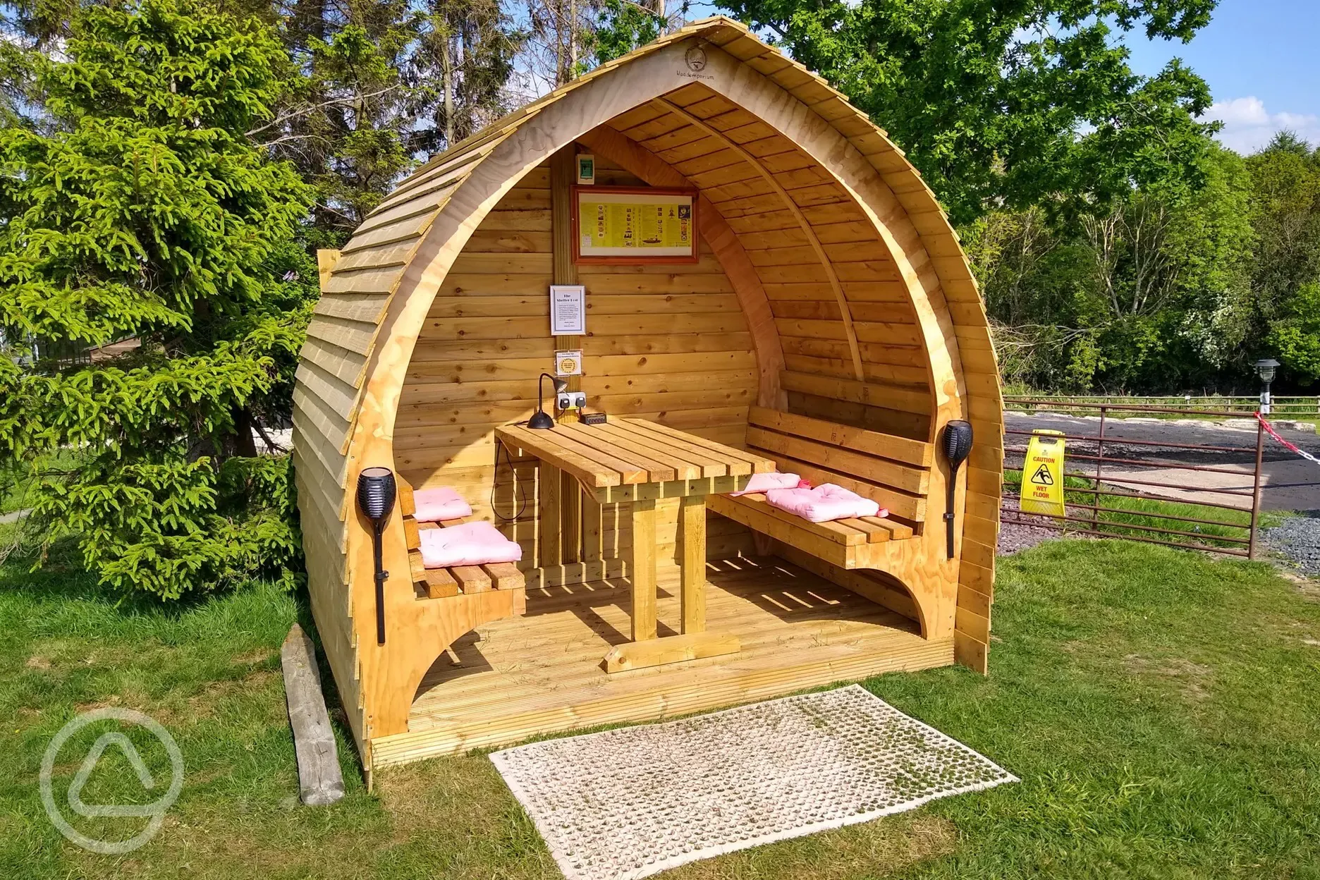 Communal pod for campers with a reading light and phone charging point Communal pod for campers with a reading light and phone charging point