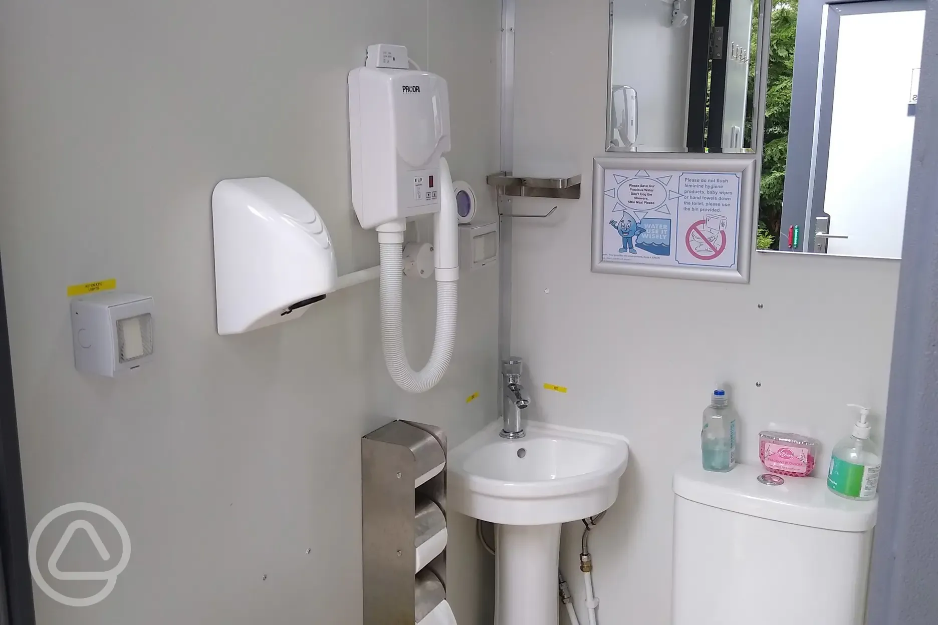 Ladies toilet block with hairdryer and hand dryer Ladies toilet block with hairdryer and hand dryer