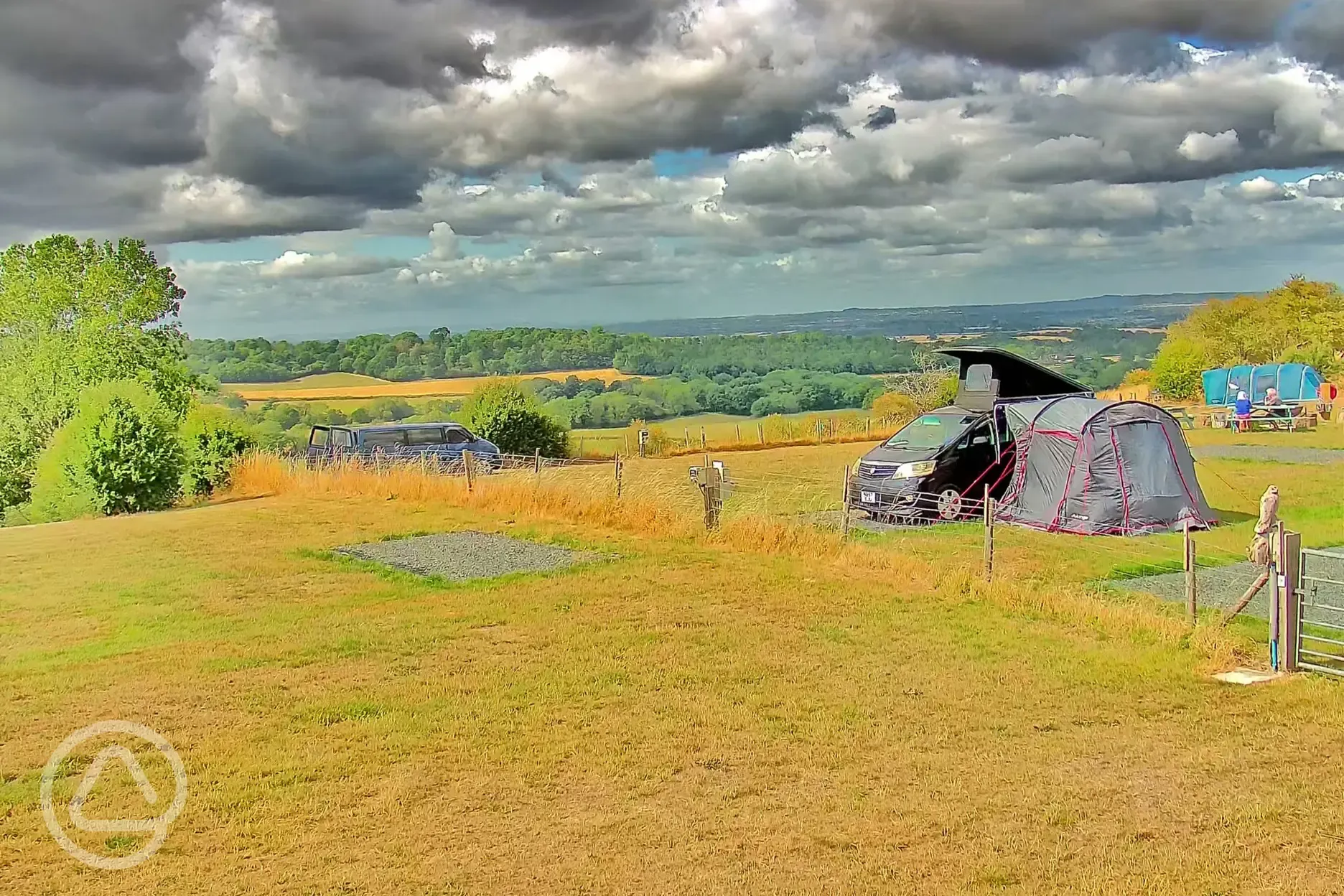 Small campervan on hardstanding pitches with awning space (optional electric) Small campervan on hardstanding pitches with awning space (optional electric)
