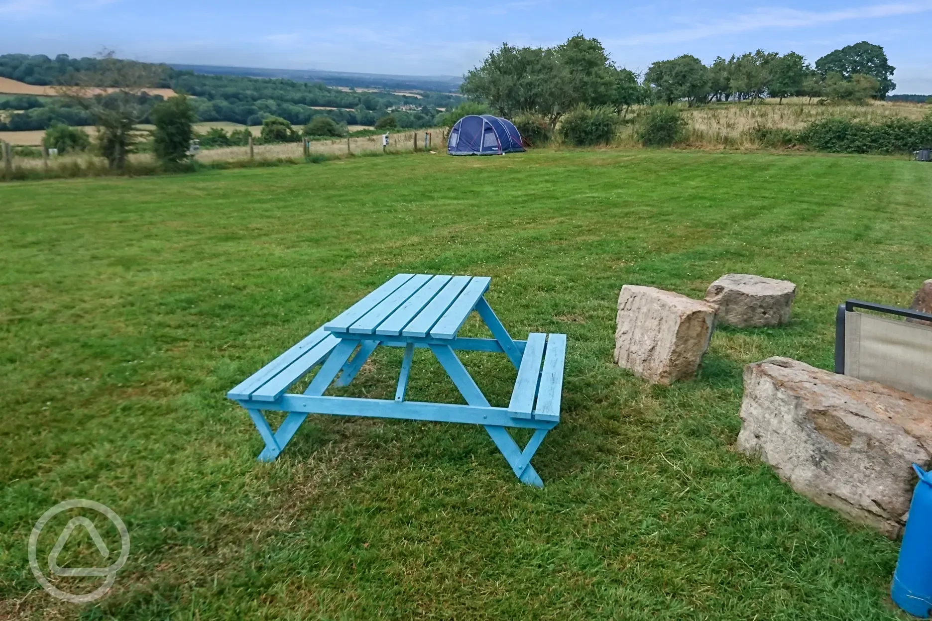 Picnic tables around the site