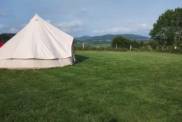 Bell tent with a view from site