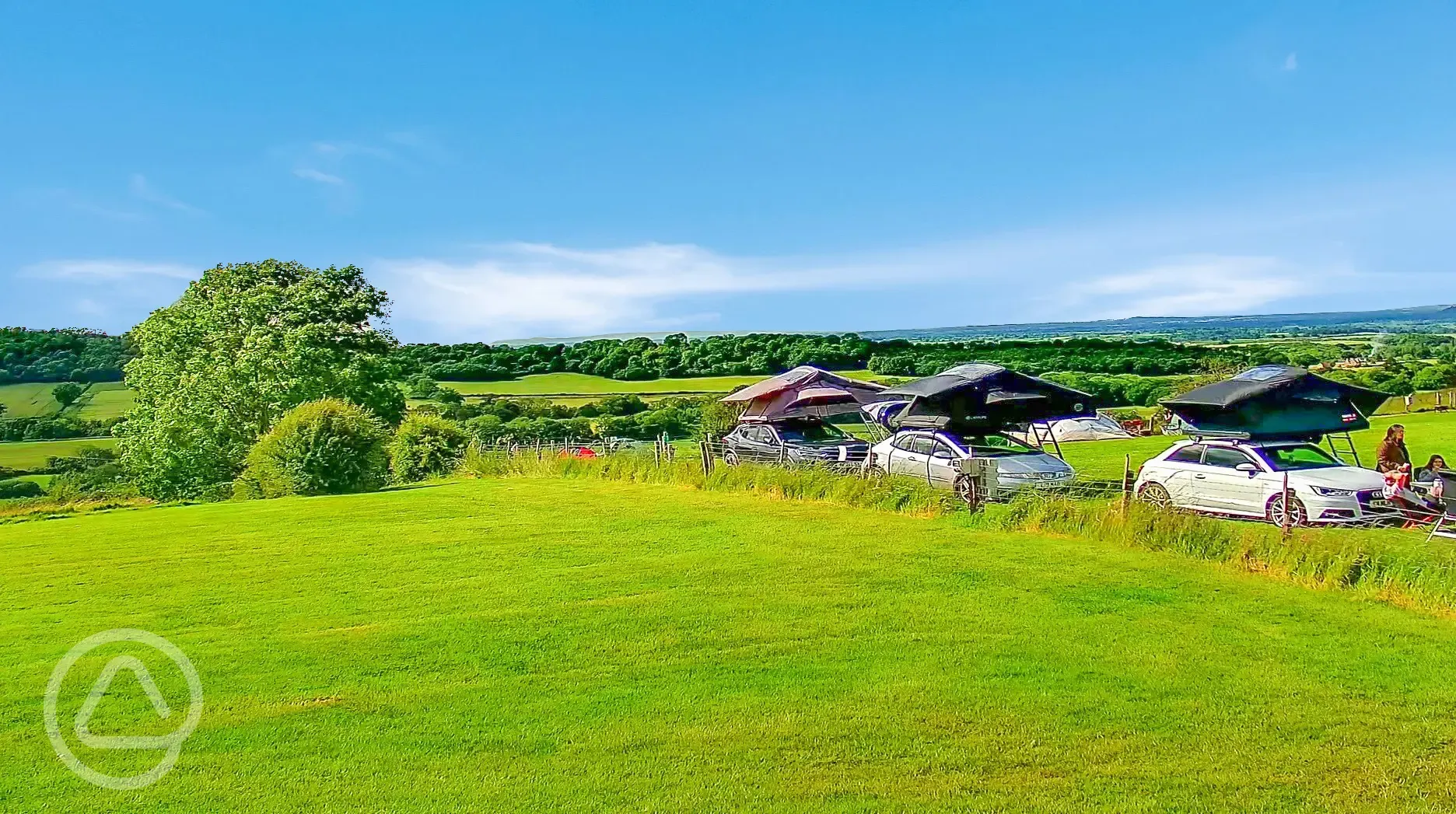 Roof tent visitors on grass pitches 