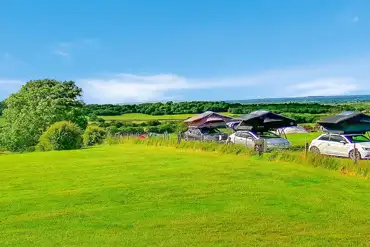 Roof tent visitors on grass pitches 