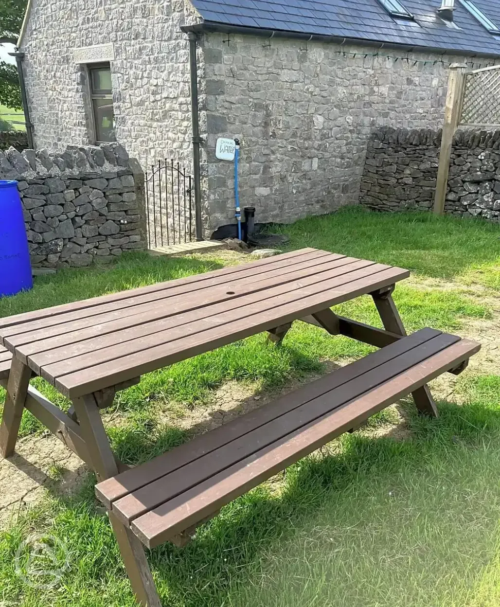 Picnic benches around site