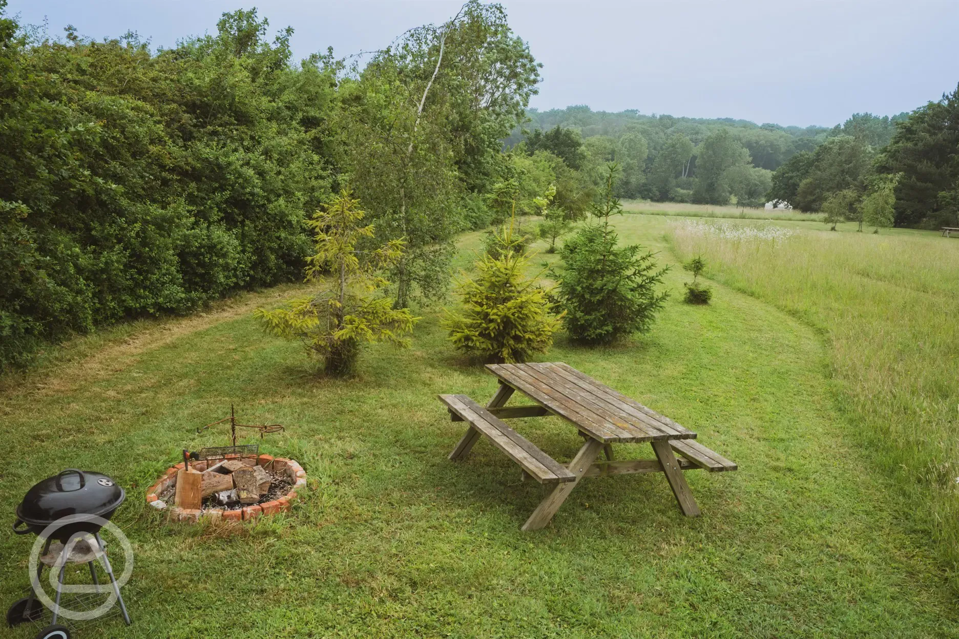 Kingfisher shepherd's hut fire pit and outside seating area