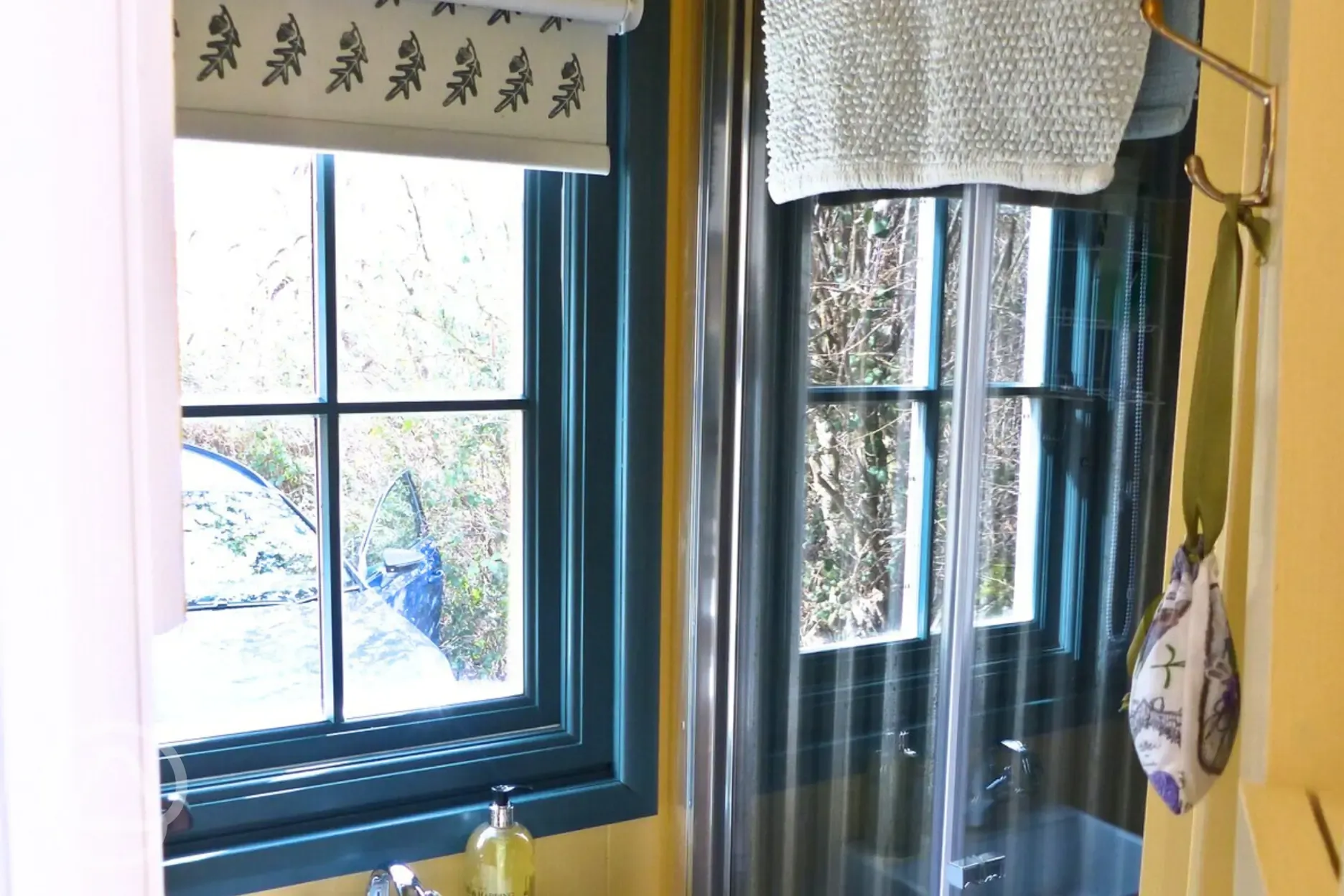 Oak shepherd's hut bathroom with towels provided