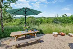 Oak shepherd's hut outdoor seating