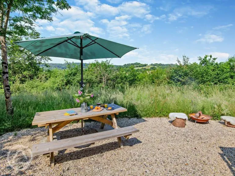 Oak shepherd's hut outdoor seating