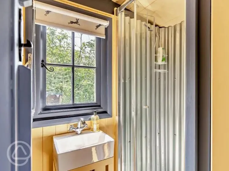 Oak shepherd's hut shower room