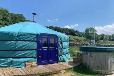 Yurt and private wood-fired hot tub at at Cherish Glamping