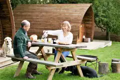 Seating outside the deluxe ensuite Wigwams