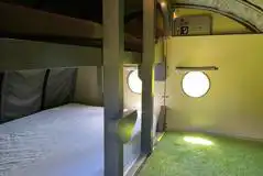 Landpod with a double and sink bunk