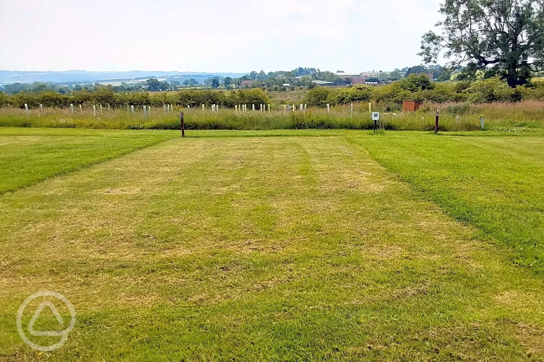 Electric grass pitches for tents and tourers