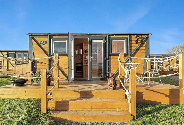 Railway wagons with raised deck areas and outdoor seating