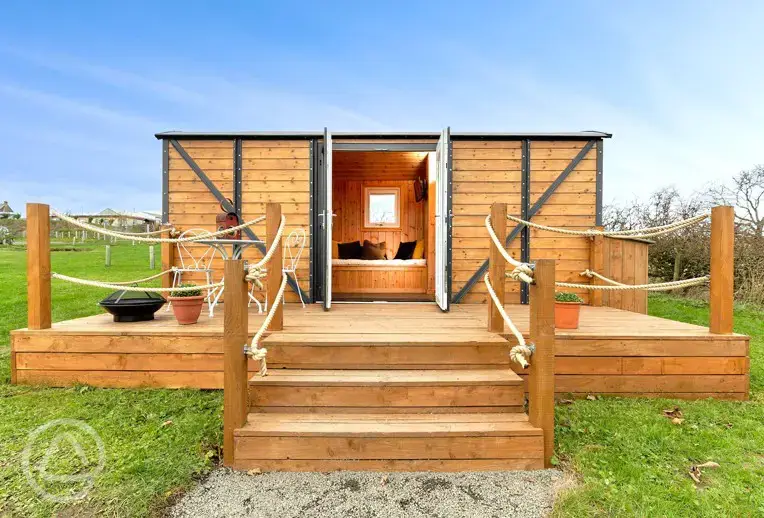 Railway wagons with raised deck areas and outdoor seating