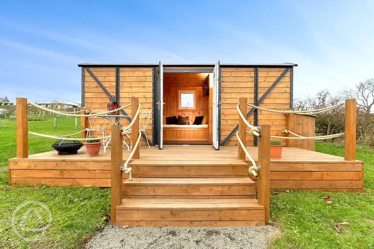 Railway wagons with raised deck areas and outdoor seating