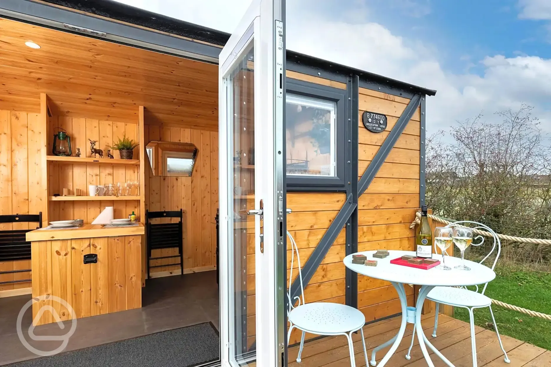 Railway wagons with raised deck areas and outdoor seating