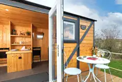 Railway wagons with raised deck areas and outdoor seating