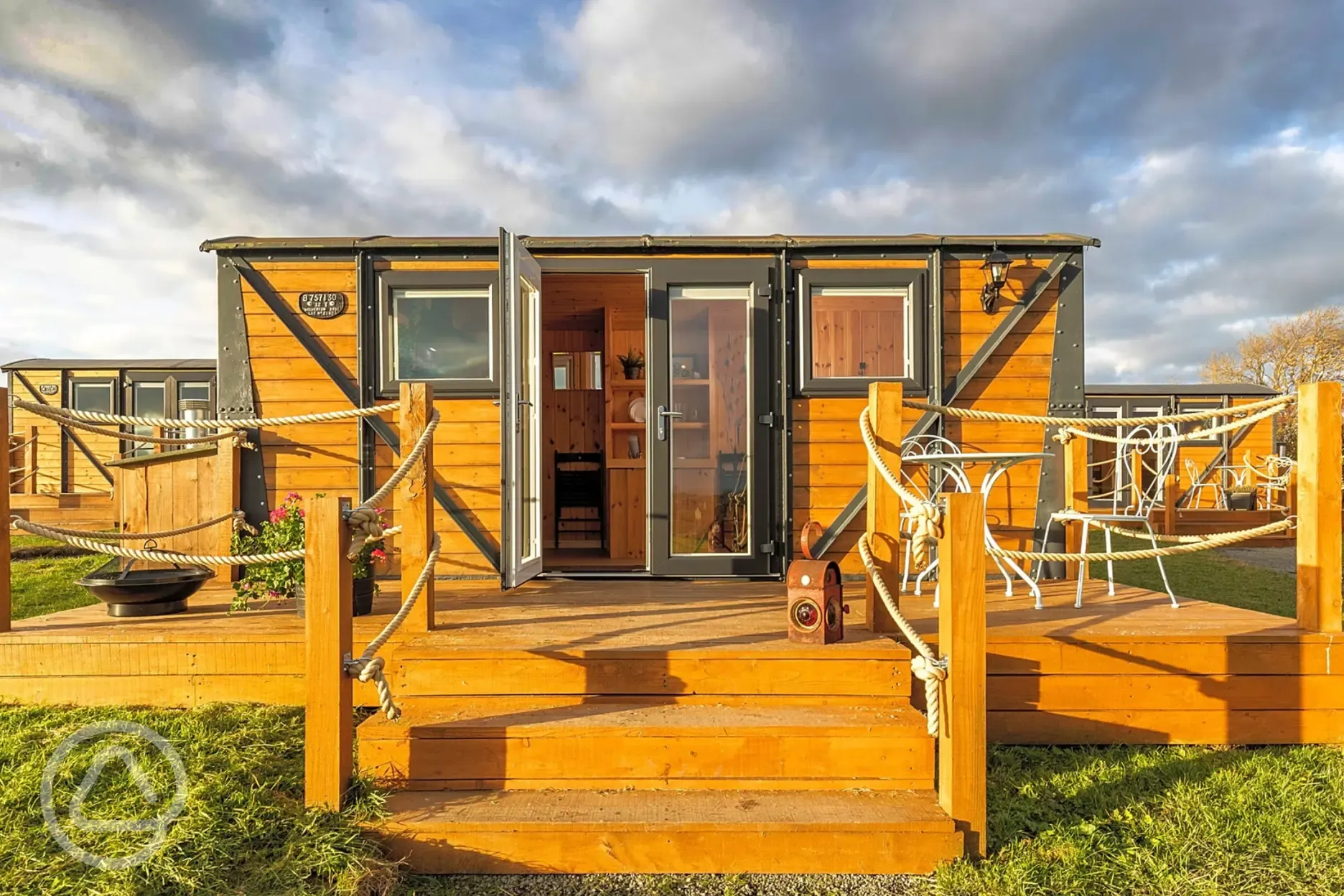 Railway wagons with raised deck areas and outdoor seating