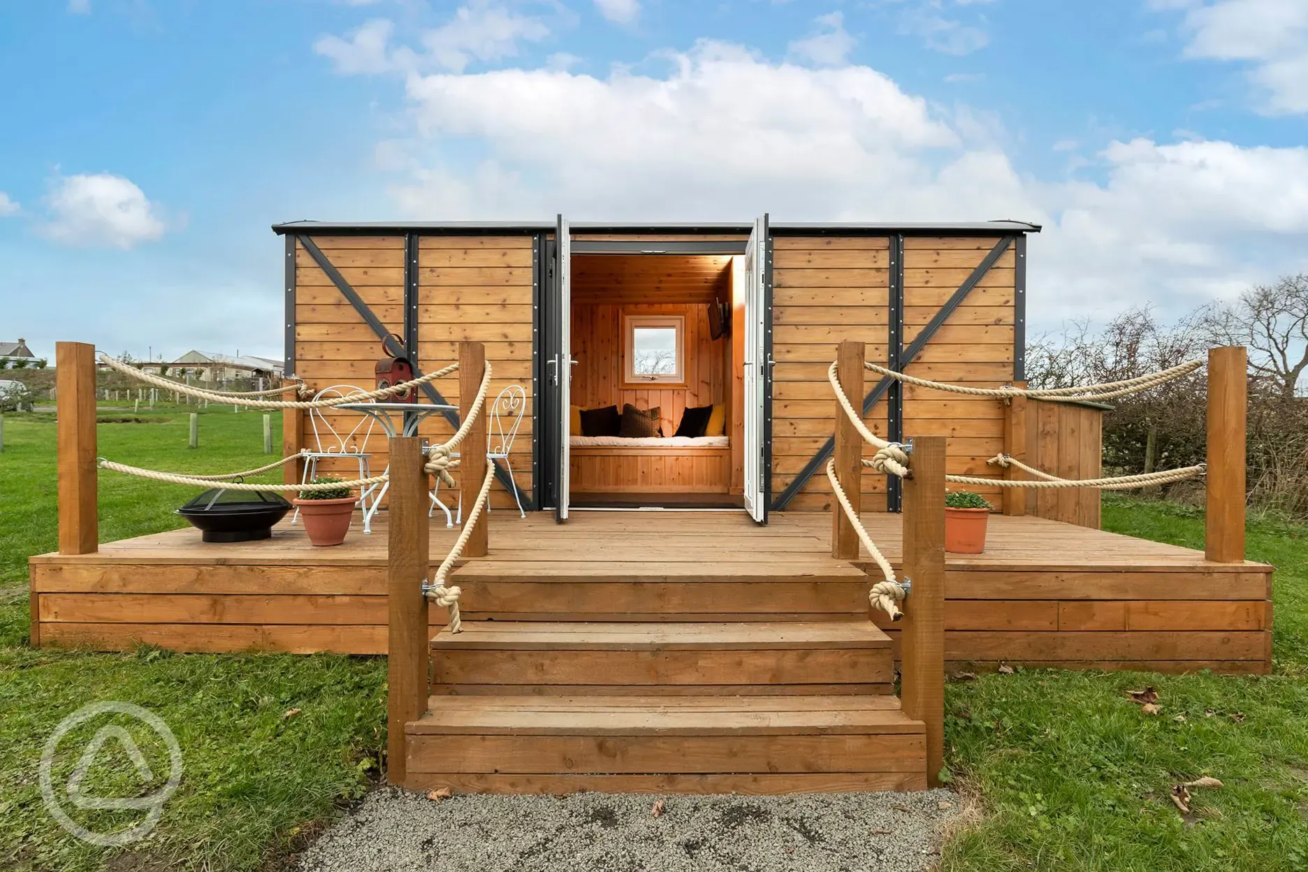 Railway wagons with raised deck areas and outdoor seating