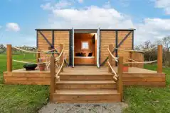 Railway wagons with raised deck areas and outdoor seating