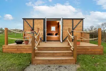 Railway wagons with raised deck areas and outdoor seating