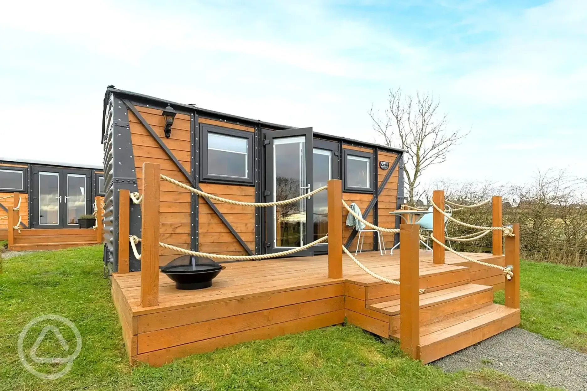 Railway wagons with raised deck areas and outdoor seating