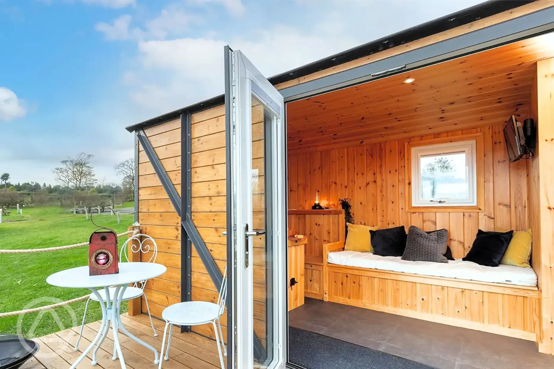 Railway wagons with raised deck areas and outdoor seating