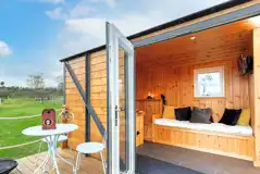 Railway wagons with raised deck areas and outdoor seating