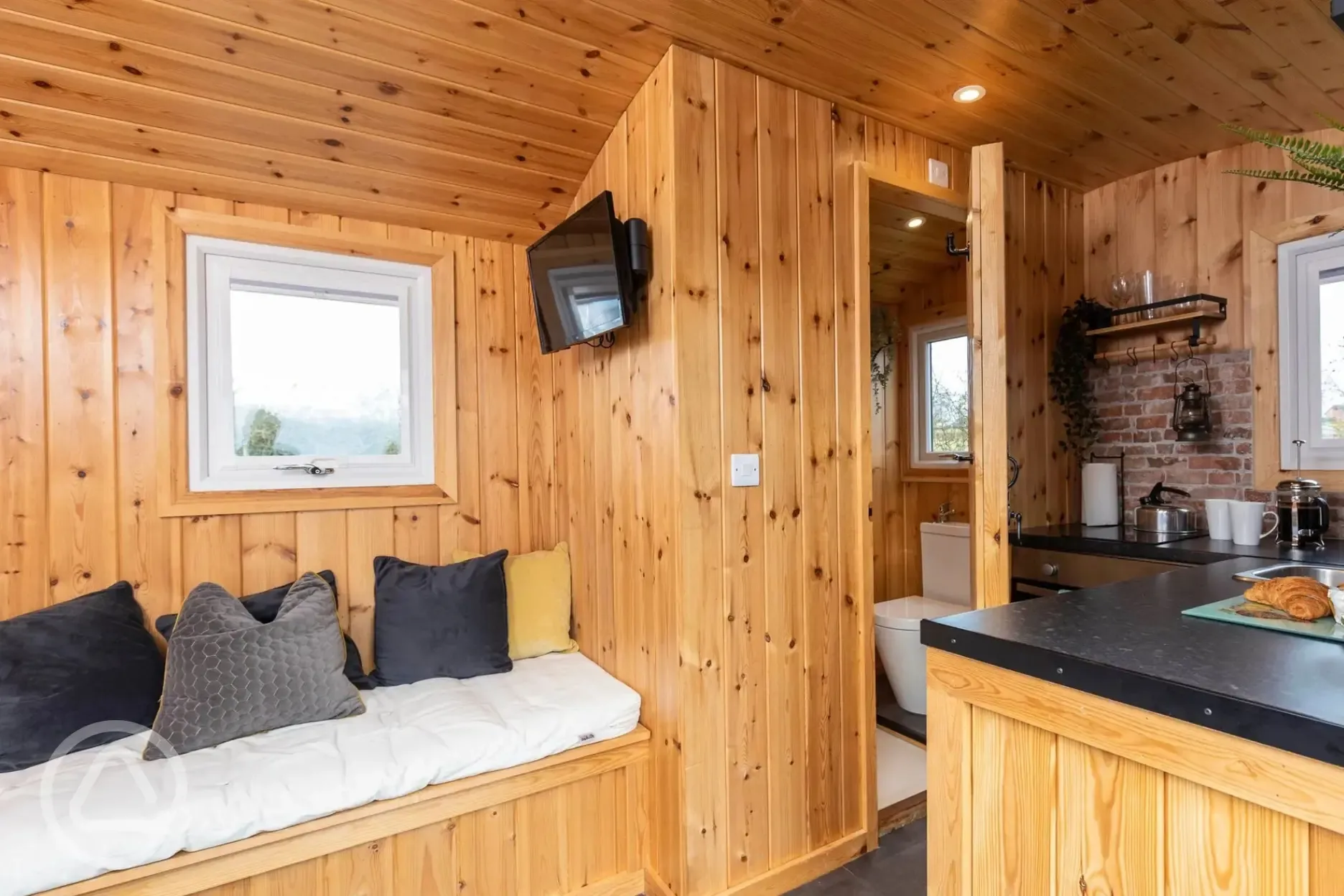 Railway wagon with sofa bench, kitchen area and ensuite bathroom