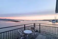 View from the Marine ensuite glamping lodge decking area on the River Hamble