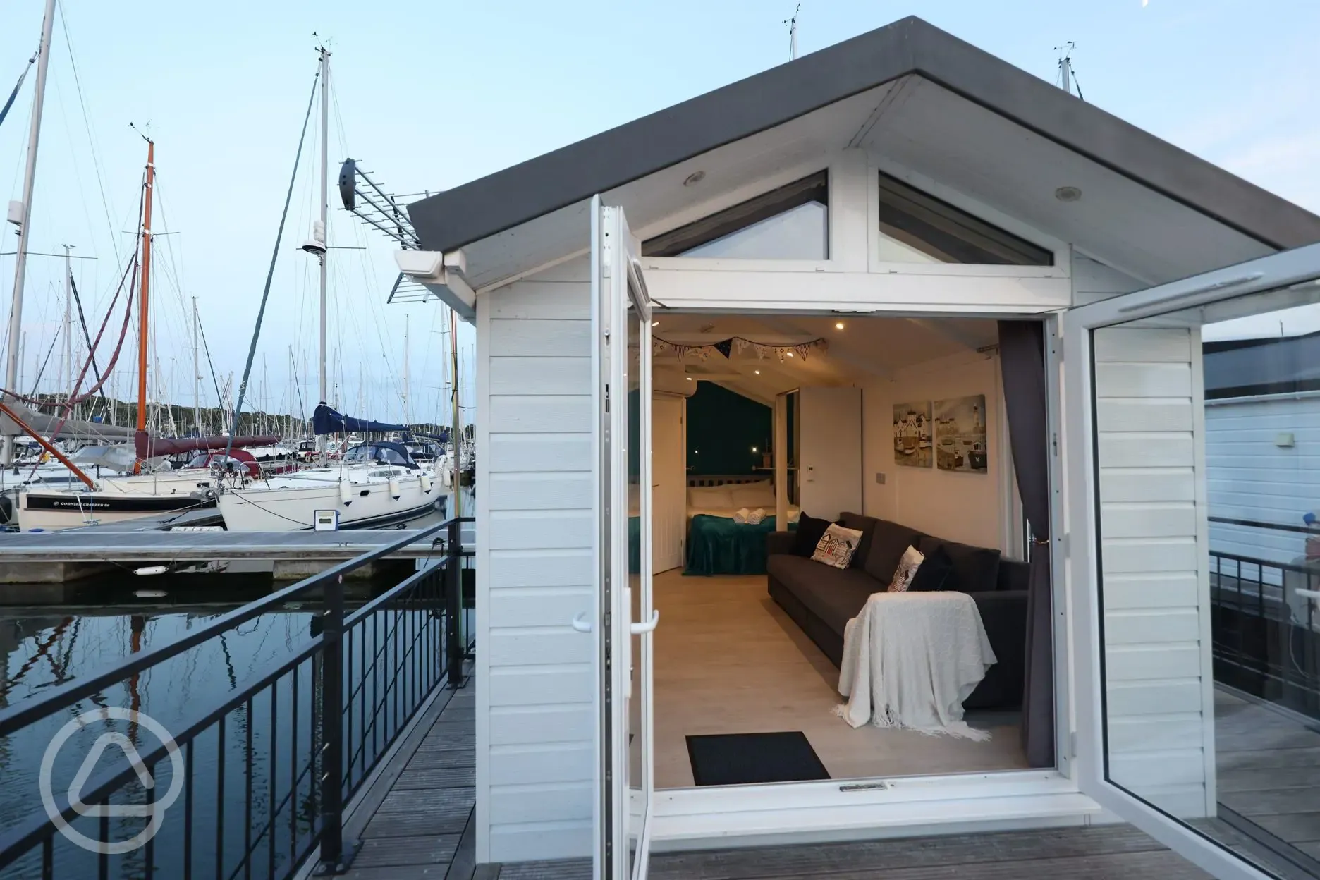 Marine ensuite glamping lodges opening onto private decking area