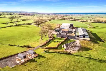 Aerial view of Hardrigg Hall Glamping and the Cumbrian countryside