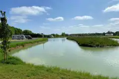 Waterside fully serviced hardstanding touring pitches Waterside fully serviced hardstanding touring pitches