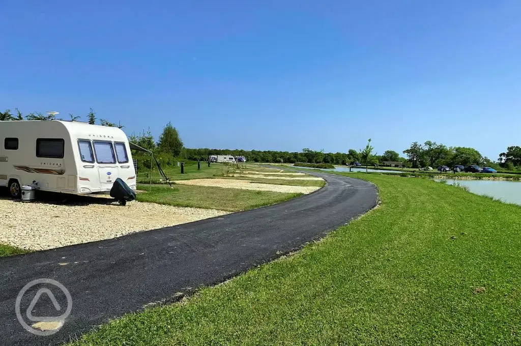 Waterside fully serviced hardstanding touring pitches