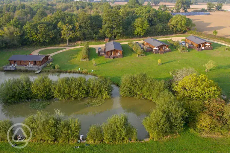 Aerial of the family friendly and adult only log cabins