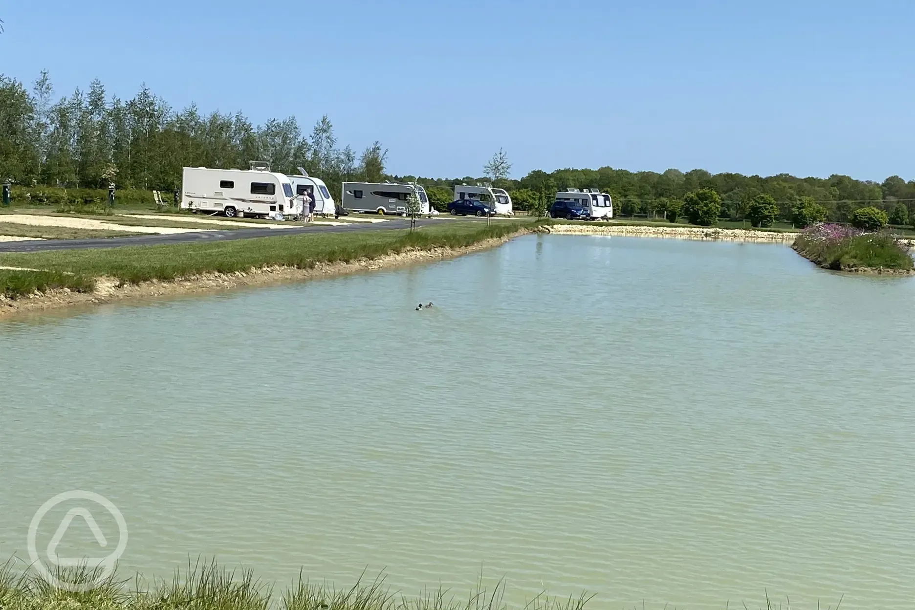 Waterside fully serviced hardstanding touring pitches