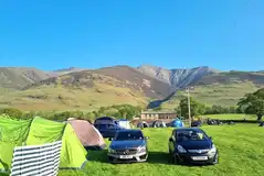 Non electric grass pitches with views of Blencathra at Low Hollows