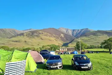 Non electric grass pitches with views of Blencathra at Low Hollows