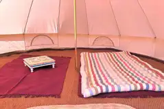 Sunset bell tent with a double air bed and bedside table (bring bedding)