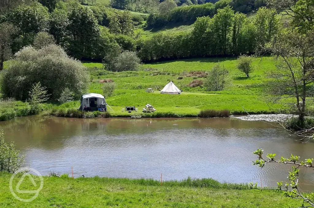 Non electric grass pitches by the lake