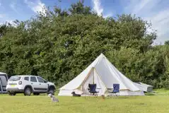 Grass pitches (optional electric) with a bell tent pitched