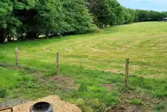 Shepherd's hut outdoor seating and fire pit
