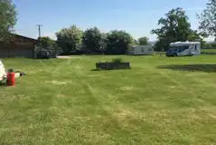 Grass pitches with optional electric at Birch Bank Farm