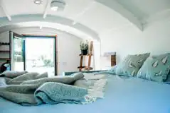Camping pod double bed with ladder access Camping pod double bed with ladder access