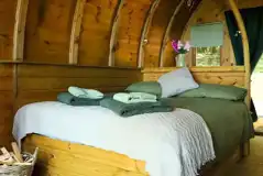Glamping pod interior with double bed Glamping pod interior with double bed