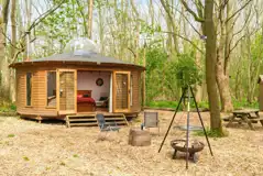 Roundhouse wooden yurt with fire pit Roundhouse wooden yurt with fire pit