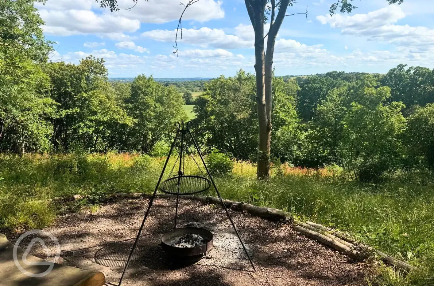 Glamping pod with outdoor fire pit area