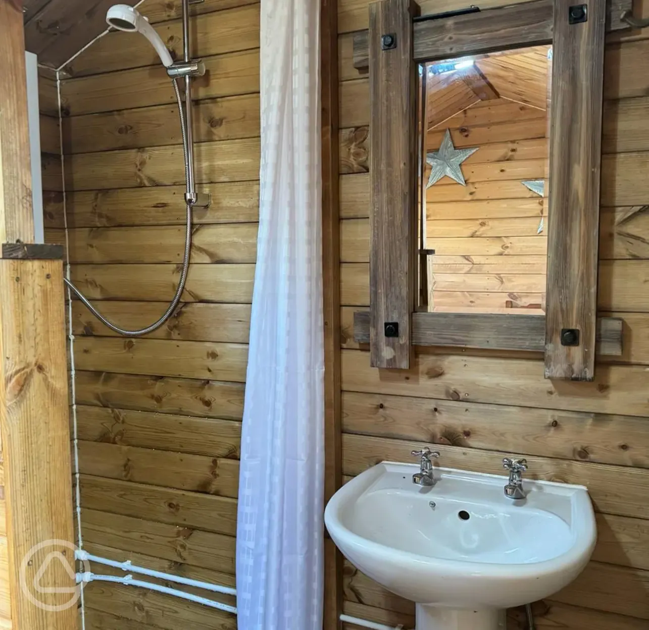 Roundhouse wooden yurt shower