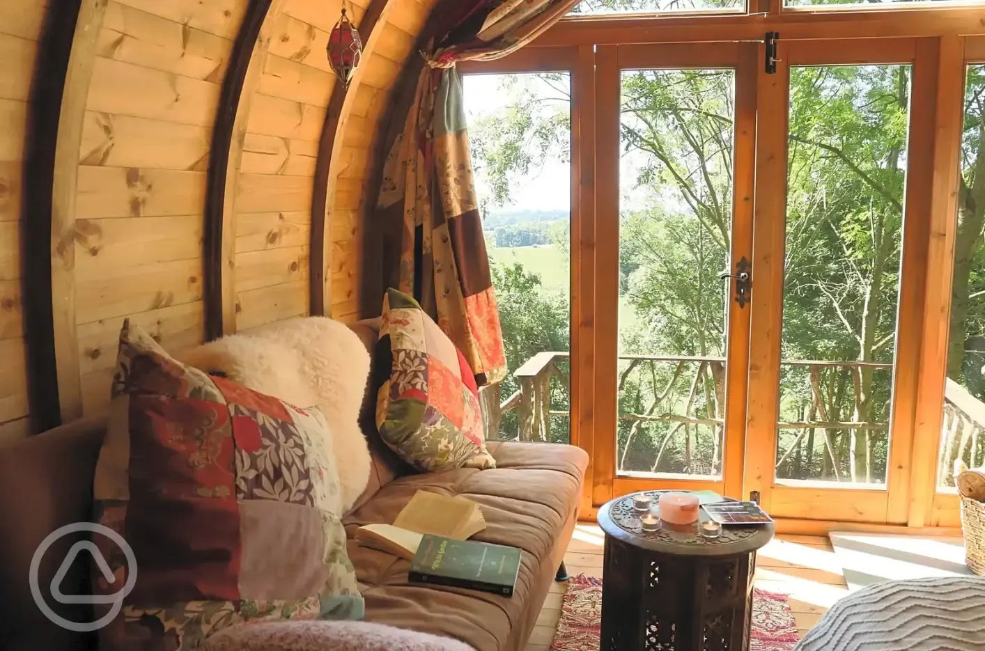 Glamping pod interior with glass front